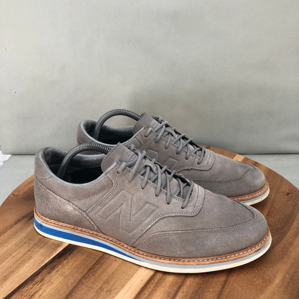 New Balance Gray Suede Oxfords with Blue Accent